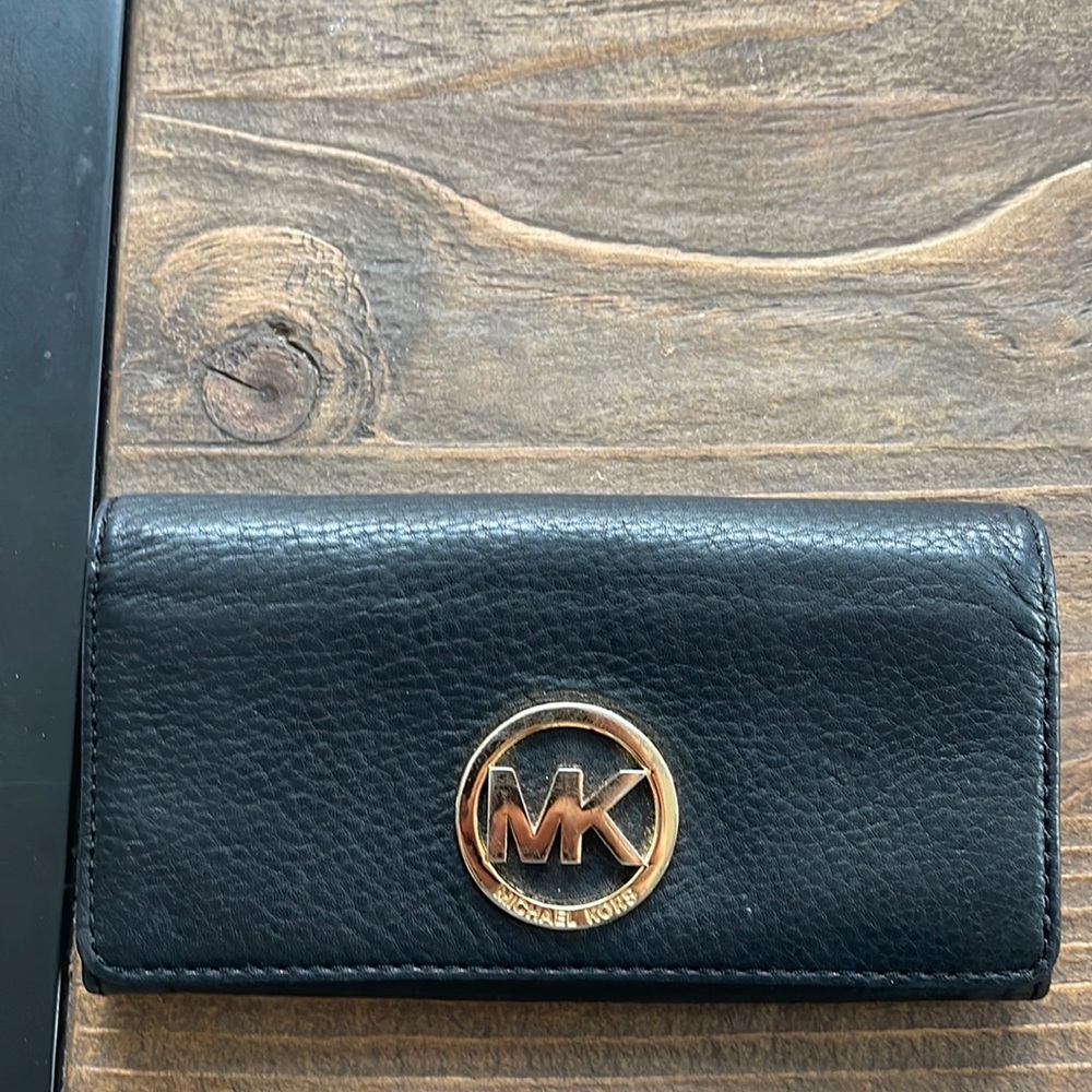 Michael Kors pebble leather black continental wallet.